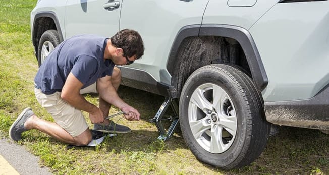Dropping A Car For Easy Tire Change photo